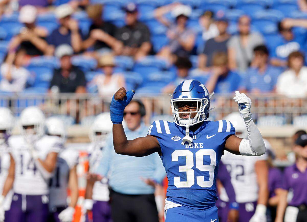 Duke’s Jeremiah Lewis gestures towards the sidelines during the first half of the Blue Devils’ 38-14 win over Northwestern on Saturday, Sept. 16, 2023, at Wallace Wade Stadium in Durham, N.C. Lewis, who suffered a broken thumb during Duke’s season-opening win over Clemson, returned to the field on Saturday.
