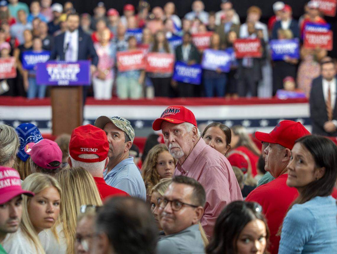 Rally attendees casts their eyes up a reporter, as Republican Vice Presidential candidate Senator J.D. Vance takes a few questions from the media during a campaign stop at Union Station on Wednesday, September 18, 2024 in Raleigh, N.C.