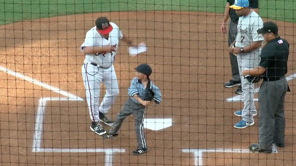 ‘Mini-umpire’ from NC gets to call World Series game from the field, thanks to Ellen