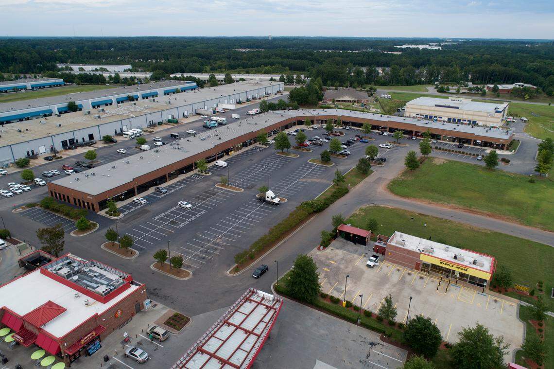 Neon Moon Spa, an illicit massage business, was tucked away in a busy Durham strip mall that also includes a Durham police department as a tenant and a school is located directly behind it. The Durham County SheriffÕs Office charged the manager, Lian Jin Xu, with promoting prostitution and released the three employees who are believed to be human-trafficking victims.
