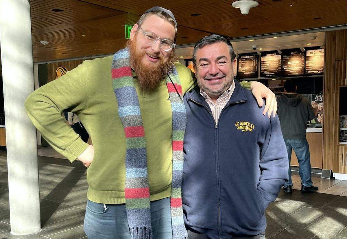 Rabbi Nossen Fellig, co-director of the Fleishman House at Duke University, and Imam Abdullah Antepli, Duke associate professor of the practice of interfaith relations, work together to determine which foods the Yalla food truck will serve that meet both kosher and halal requirements.