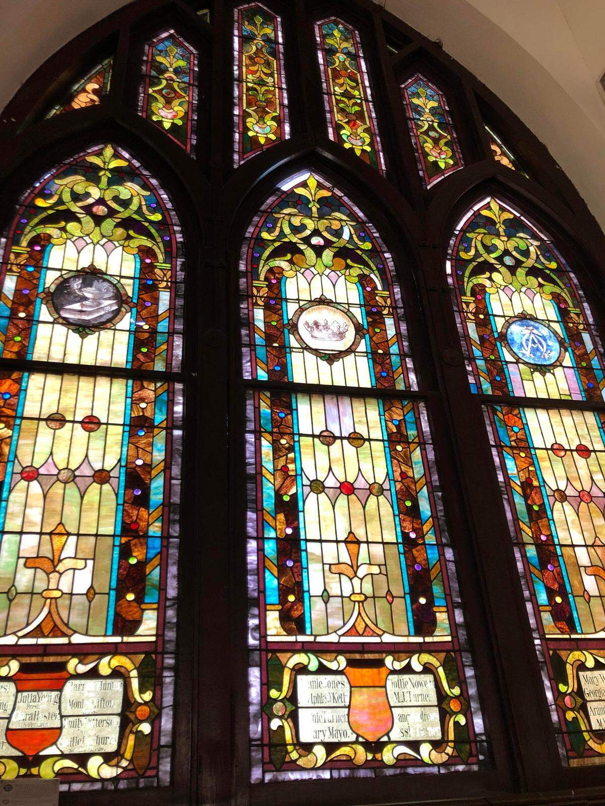 A stained-glass window in the historic sanctuary of St. Paul African Methodist Episcopal Church in Raleigh. The church celebrated its 175th anniversary Sunday.