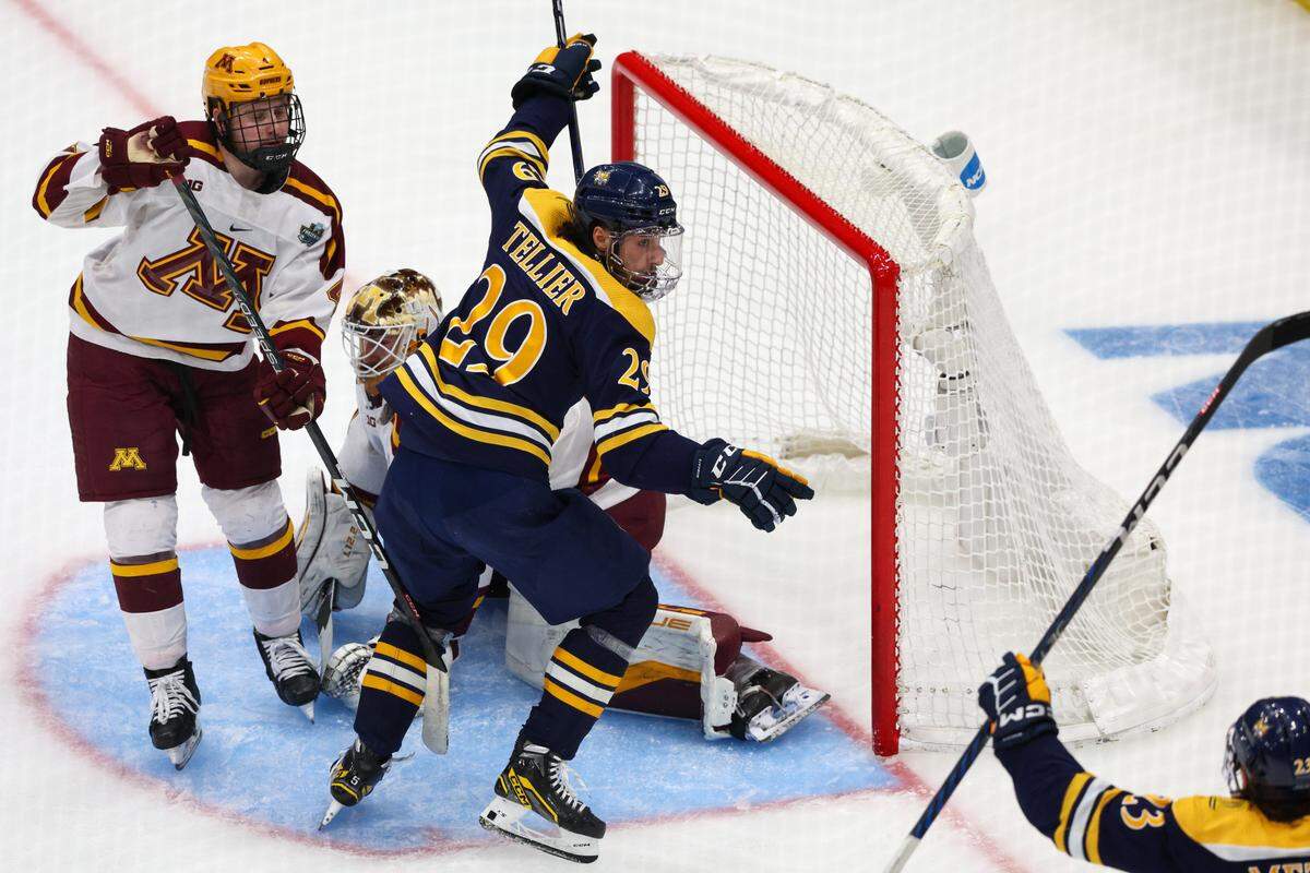 Quinnipiac forward Cristophe Tellier (29) celebrates after scoring a goal against Minnesota in the second period period during the national championship game of the 2023 Frozen Four college ice hockey tournament at Amalie Arena.