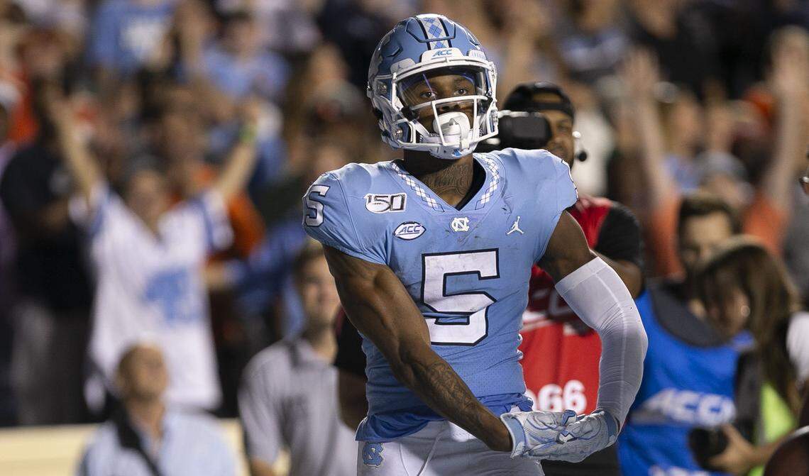 North Carolina’s Dazz Newsome (5) celebrates after scoring on the Tar Heels final drive of the game, scoring on a ten-yard pass from Sam Howell late in the fourth quarter on Saturday, September 7, 2019 at Kenan Stadium in Chapel Hill, N.C.