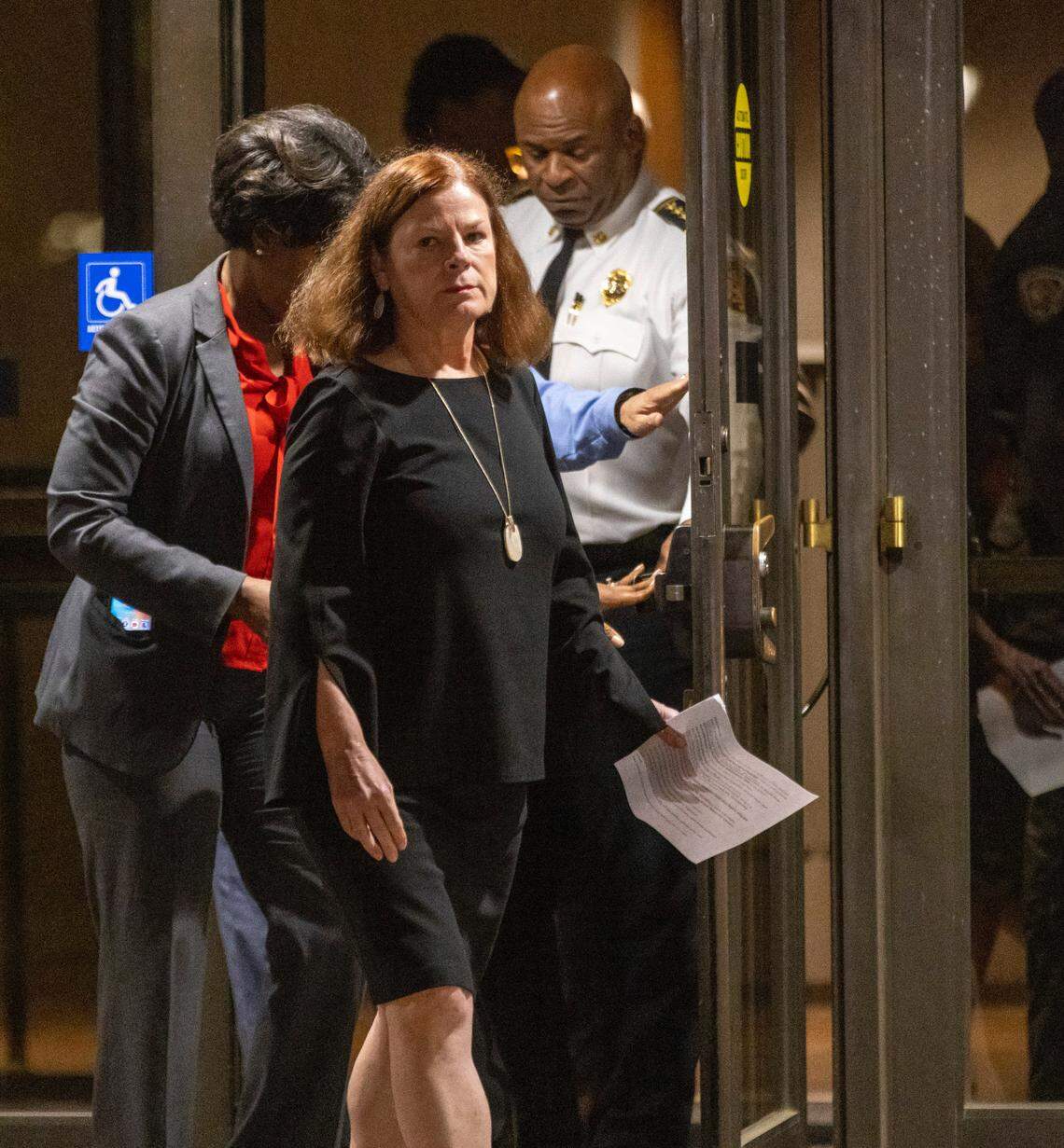 Raleigh Mayor Mary-Ann Baldwin, Raleigh City Manager Marchell Adams-David and Raleigh Fire Chief Herbert Griffin arrive for a press briefing at the Raleigh Municipal Building on Thursday, October 13, 2022 in Raleigh, N.C. Multiple people were shot, and at least five people were killed on the Neuse River Greenway on Thursday afternoon in Raleigh.
