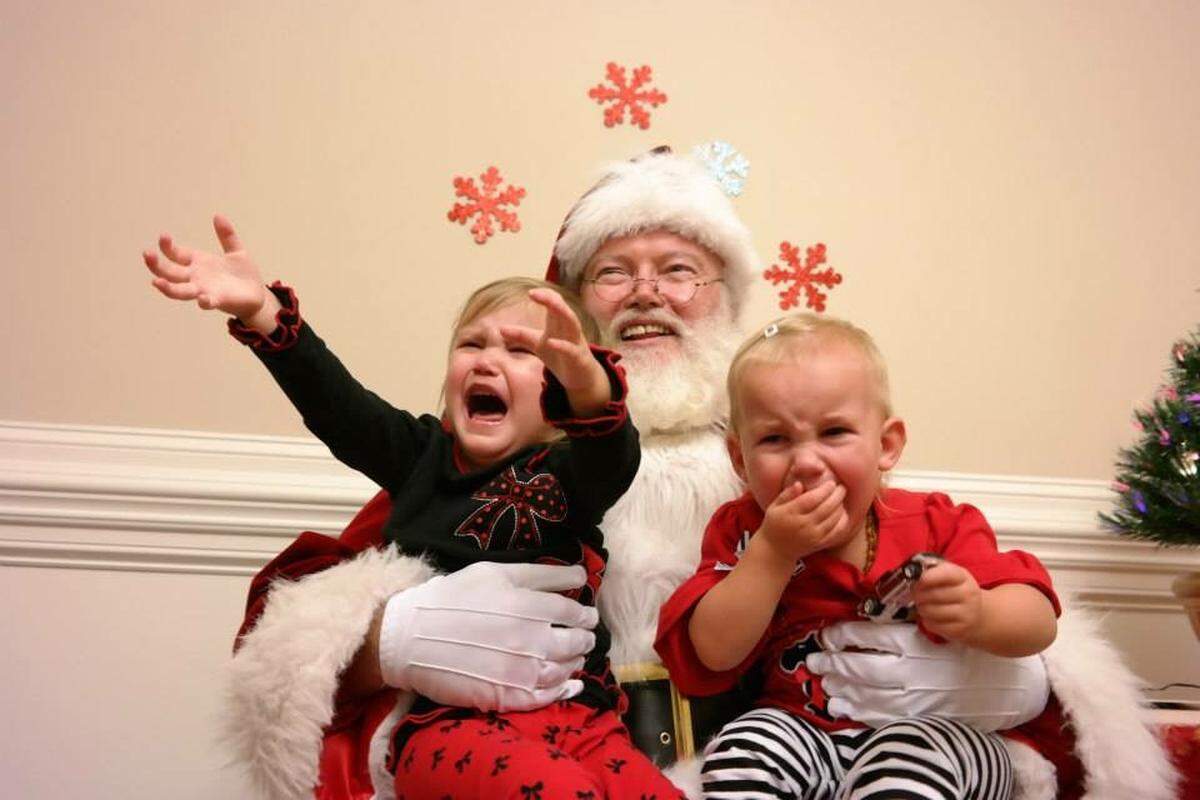 Heather Calhoun’s children with Santa.