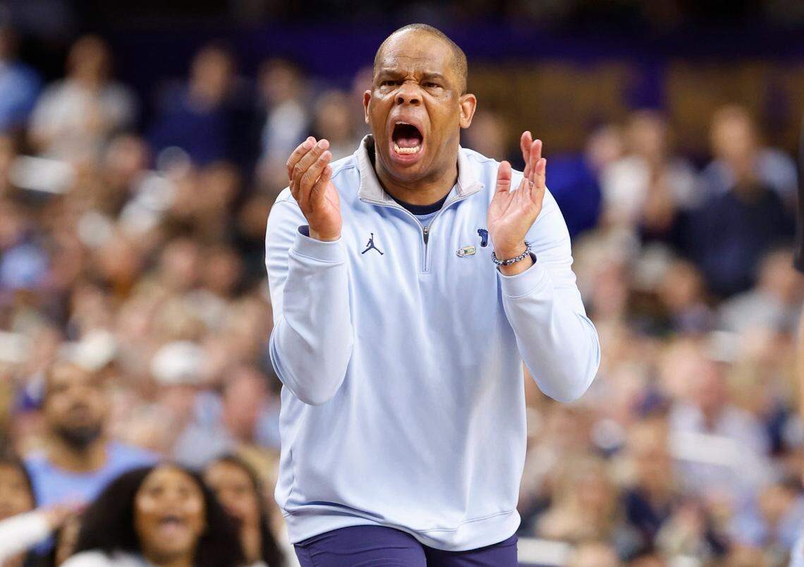 North Carolina head coach Hubert Davis encourages his team during the first half of Dukes game against UNC in the Final Four at Caesars Superdome in New Orleans, La., Saturday, April 2, 2022.