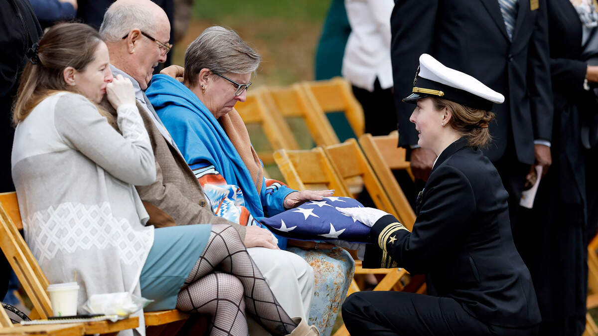 The Navy honor guard presents Mary Marshall’s family an American flag during an Oct. 29, 2022 memorial service in Raleigh. Marshall was one of the five people killed in a mass shooting Oct. 13, 2022 in Raleigh’s Hedingham neighborhood.
