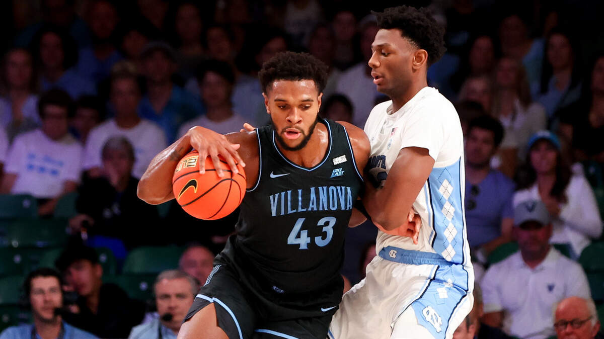 Villanova Wildcats forward Eric Dixon (43) controls the ball as North Carolina Tar Heels forward Jalen Washington (13) defends during the first half at Imperial Arena.