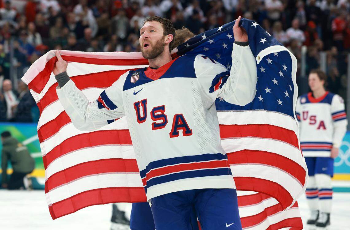 Jaccob Slavin of Team United States celebrates a 2-1 victory against Canada in overtime during the men's gold medal game between Canada and the United States on Feb. 22, 2026, in Milan, Italy. 