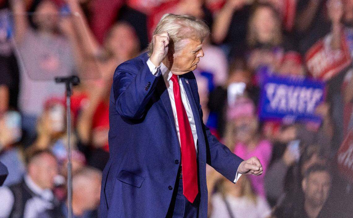 Former President Donald Trump dances while leaving the stage following a rally speech at Minges Coliseum in Greenville on Monday, Oct. 21, 2024. With two weeks until Election Day, Trump went on a three-city tour, in which Trump will also see the destruction caused by Hurricane Helene in Asheville and speak at a faith conference in Concord.
