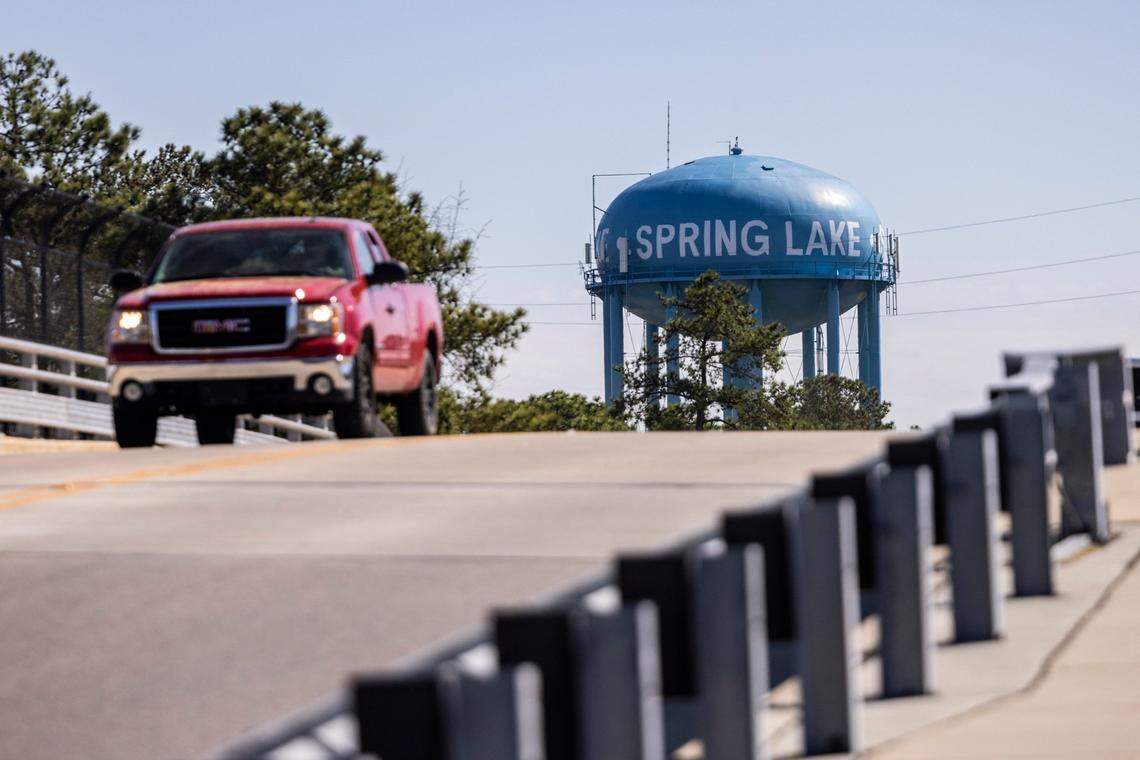 The town of Spring Lake is missing nearly $500,000 after hiring a finance director with personal bankruptcies, tax liens and no resume.