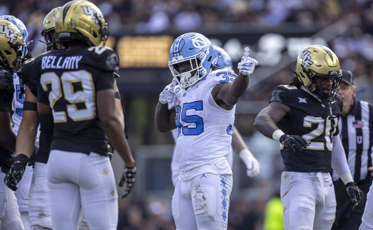 North Carolina running back Demon June (35) signals for a first down after a 13-yard gain in the second quarter against the University of Central Florida on Saturday, September 20, 2025 at Acrisure Bounce House Stadium in Orlando, Fla.