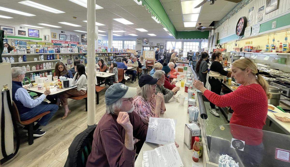 Patrons eat at Ashworth Drugs in Cary, N.C., on Wednesday, February 8, 2024.