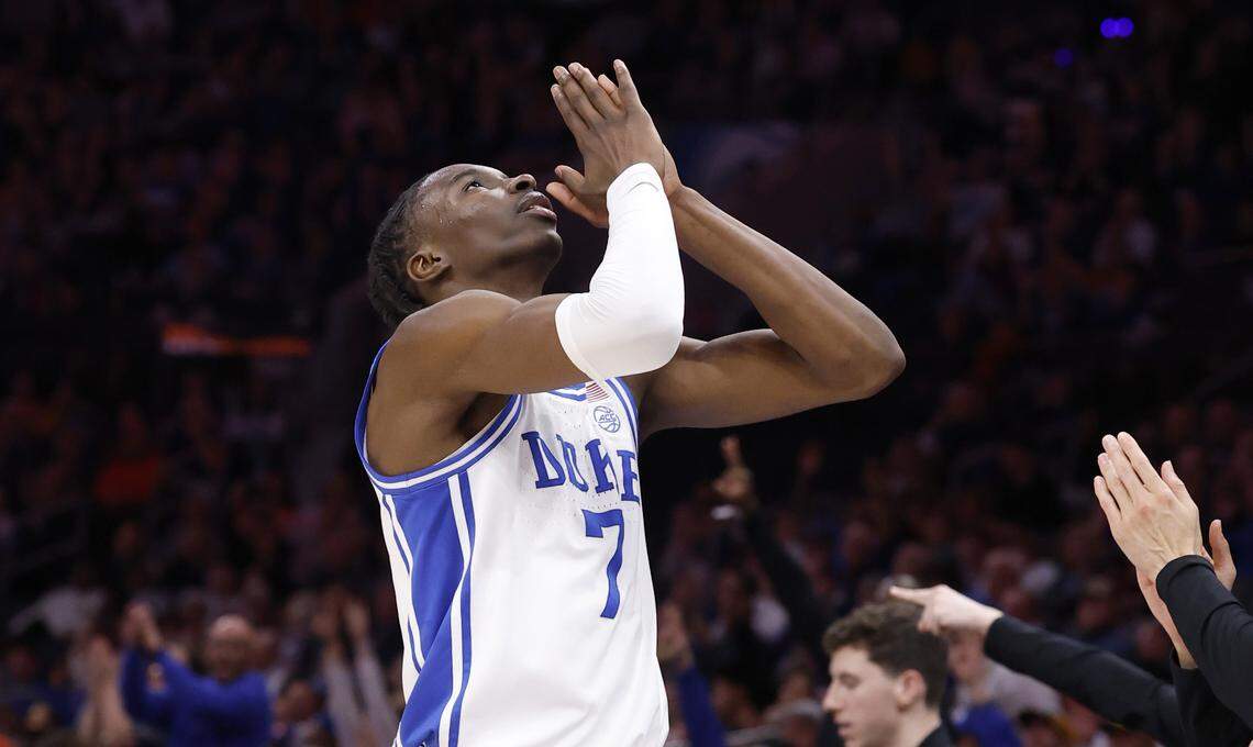 Duke’s Dame Sarr (7) reacts after hitting a three-pointer during the second half of Duke’s 73-61 victory over Clemson in the semifinals of the 2026 ACC Men’s Basketball Tournament at the Spectrum Center in Charlotte, N.C., Friday, March 13, 2026.