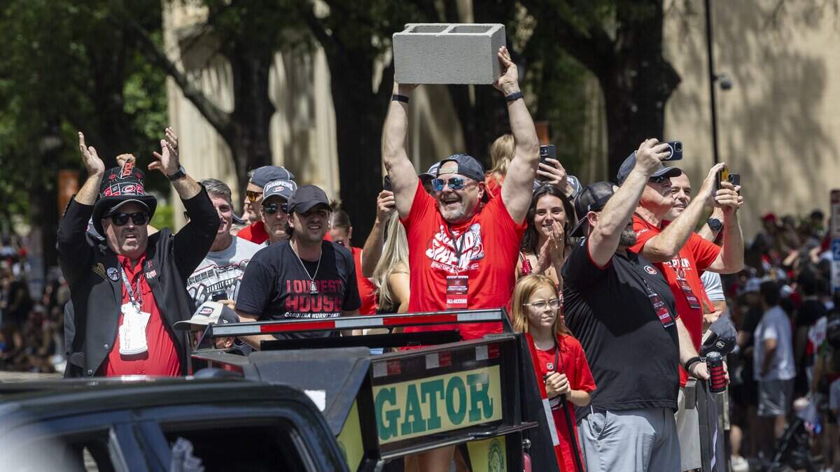 Thousands of Carolina Hurricanes fans gather in downtown Raleigh on Saturday, June 20, 2026, during a parade and rally celebrating the Hurricanes' Stanley Cup Final victory over the Vegas Golden Knights. The Hurricanes won the series 4-2 to capture the Stanley Cup for the second time since 2006.