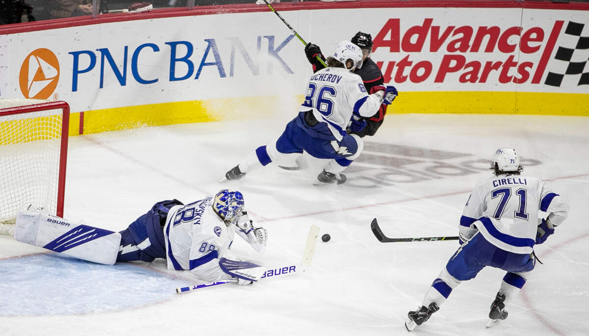 Tampa Bay goalie Andrei Vasilevskiy (88) denies a scoring attempt by Carolina Hurricanes’ Vincent Trocheck (16) during the second period in game five on Tuesday, June 8, 2021 at PNC Arena in Raleigh, N.C.