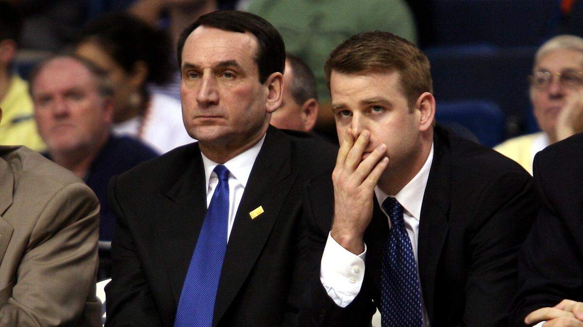 Duke’s basketball coaches Mike Krzyzewski and Steve Wojciechowski watch the action during the N.C. State game in the 2007 Men’s ACC Tournament at the St. Pete Times Forum on Thursday, March 8, 2007 in Tampa, Florida. Duke lost 85-80.