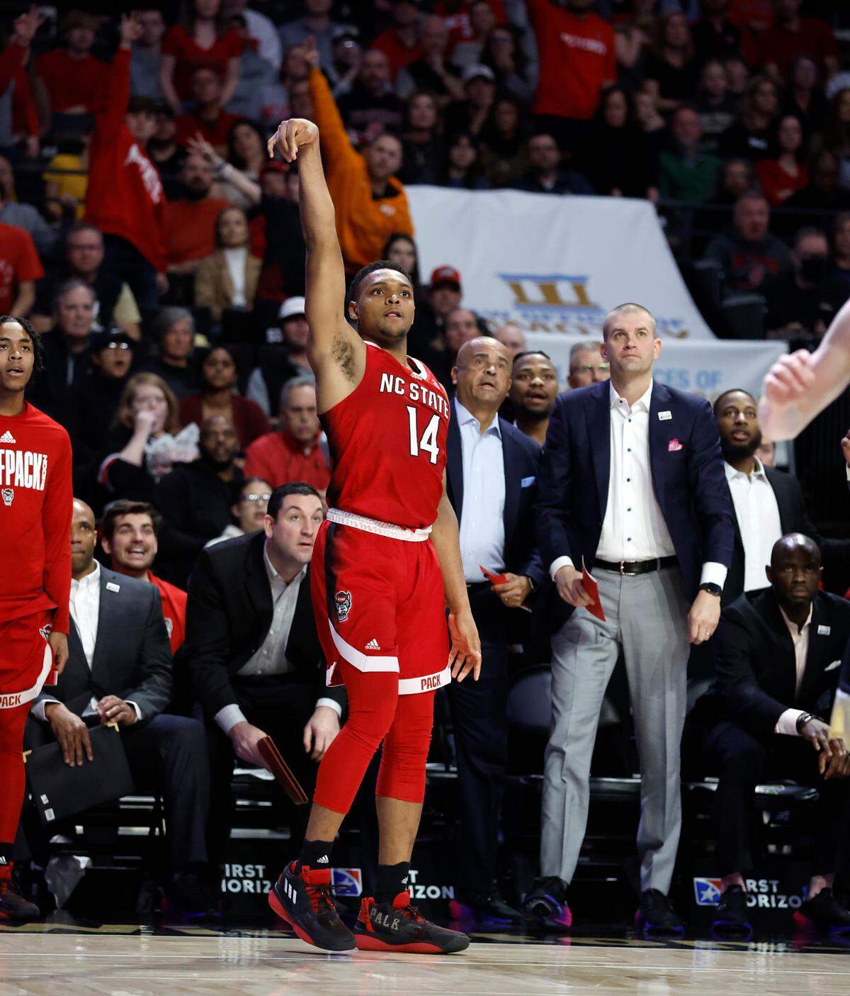 N.C. State’s Casey Morsell (14) watches as his three-pointer goes in during the second half of N.C. State’s 79-77 victory over Wake Forest at Joel Coliseum in Winston-Salem, N.C., Saturday, Jan. 28, 2023.