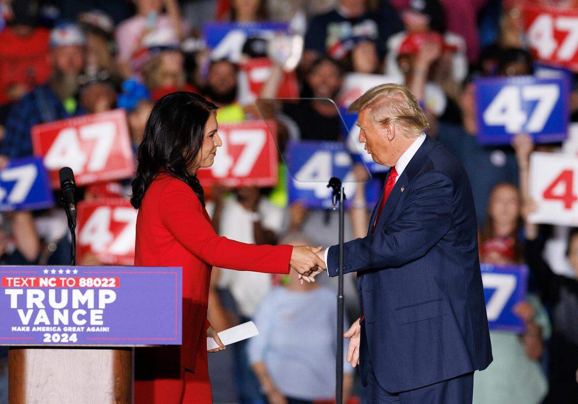Tulsi Gabbard, a former Democratic congresswoman from Hawaii, with former President Donald Trump after announcing that she’s joining the Republican party during a rally at the Greensboro Coliseum Complex on Tuesday, Oct. 22, 2024, in Greensboro, N.C.