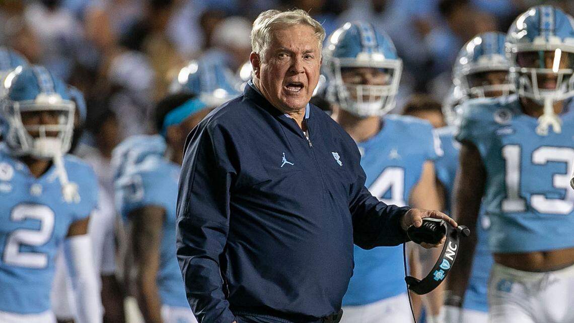 North Carolina coach Mack Brown steps to the field to huddle with his offensive unit in the third quarter on Saturday, September 11, 2021 at Kenan Stadium in. Chapel Hill, N.C.