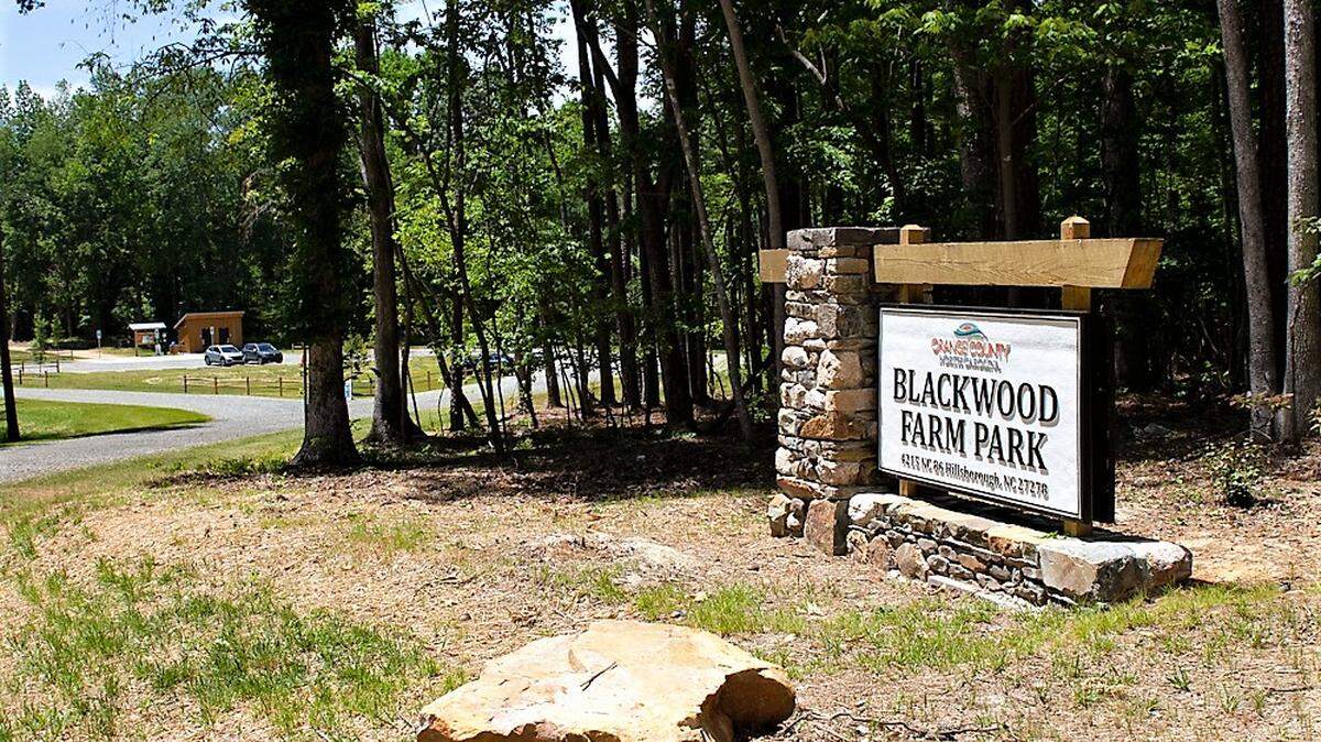 A new and improved sign welcomes visitors to Blackwood Farm Park on N.C. 86 at New Hope Church Road in Orange County. Additional work is planned, including a 32-acre disc golf course and a learning center.