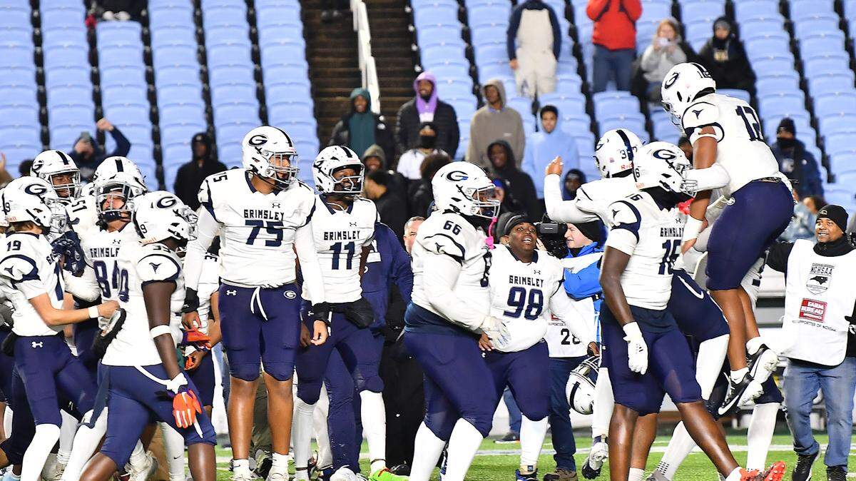 The Greensboro Grimsley Whirlies celebrate after defeating Rolesville in the NCHSAA 4A Championship game. The Rolesville Rams and the Greensboro Grimsley Whirlies met in the NCHSAA 4A football Championship Game in Chapel Hill, N.C. on December 20, 2024.