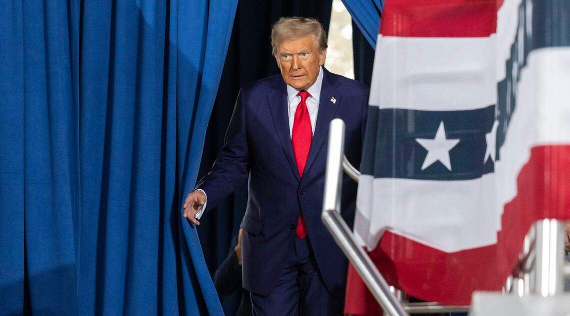 Republican presidential nominee and former President Donald Trump takes the stage during a rally at Dorton Arena in Raleigh on Monday, Nov. 4, 2024, one day before Election Day.