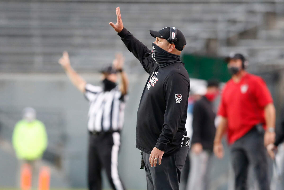 N.C. State defensive coordinator Tony Gibson instructs his players during the second half of N.C. State’s 31-20 victory over Duke at Carter-Finley Stadium in Raleigh, N.C., Saturday, Oct. 17, 2020.