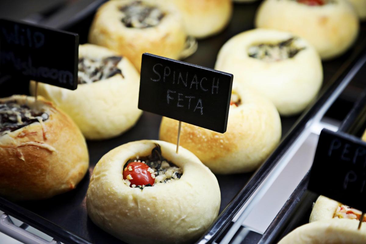 Kolaches, Carroll’s Kitchen signature take on traditional Eastern European rolls with a variety of sweet and savory fillings (spinach and feta, wild mushroom, coconut cream, and apple pie, to name a few), are the star of the show here.