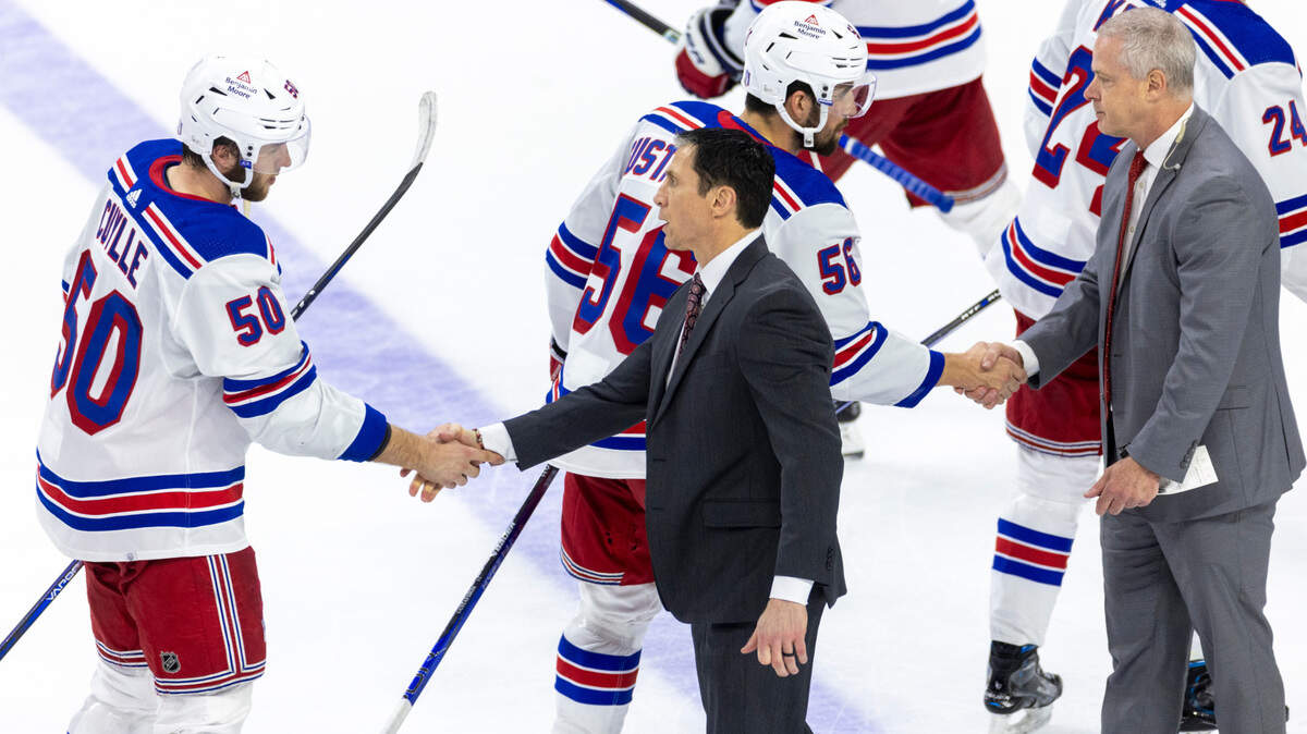 Carolina Hurricanes coach Rod Brind’Amour shakes hands with New York Rangers left wing Will Cuylle (50) after falling 5-3 to the Rangers in Game 6 in the second round of the 2024 Stanley Cup playoffs on Thursday, May 16, 2024 at PNC Arena in Raleigh N.C.