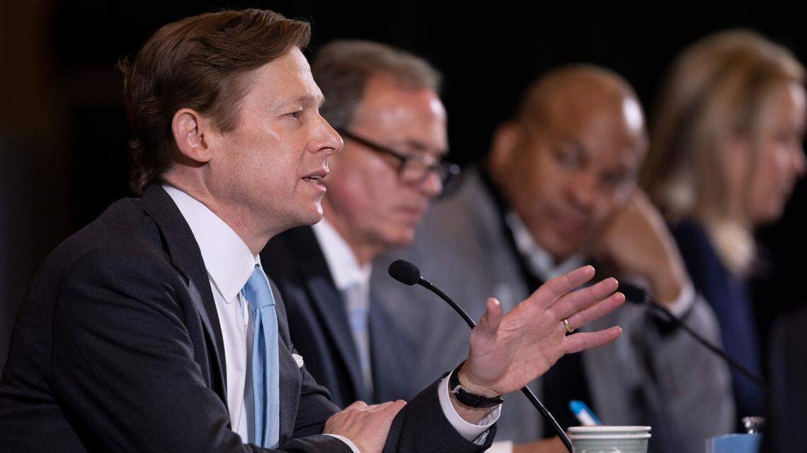 Interim UNC-Chapel Hill Chancellor Lee Roberts addresses the Board of Trustees during its meeting at Alumni Hall on Jan. 18, 2024 in Chapel Hill. Board chair John Preyer is to his left.