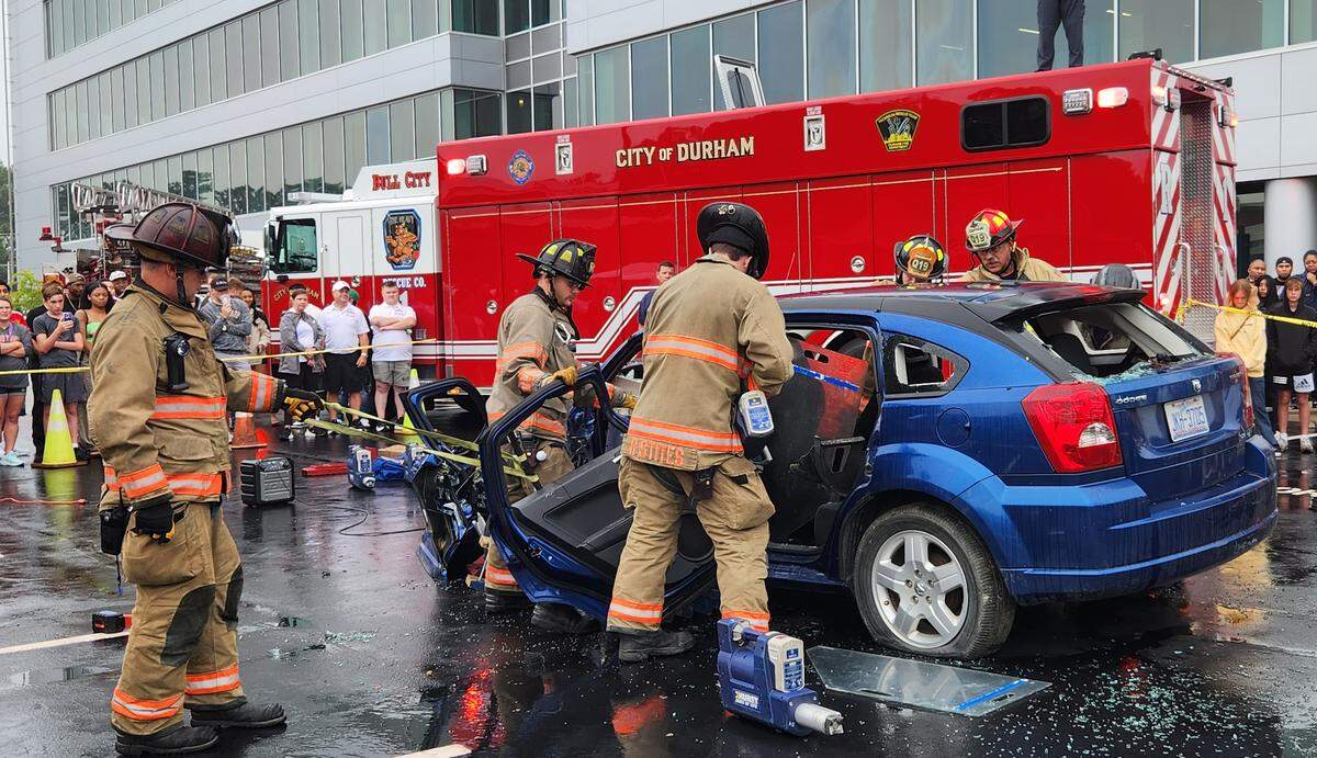 Durham firefighters demonstrate how they extract people from a crashed car on Saturday, Aug. 2, 2025.