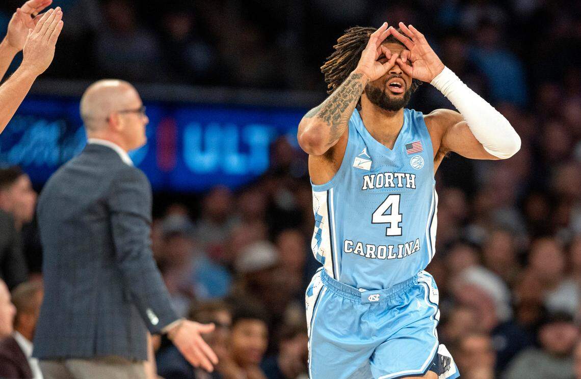 North Carolina’s R.J. Davis (4) reacts after sinking a three-point basket against Connecticut during the first half in the Jimmy V Classic on Tuesday, December 5, 2023 at Madison Square Garden in New York, NY.