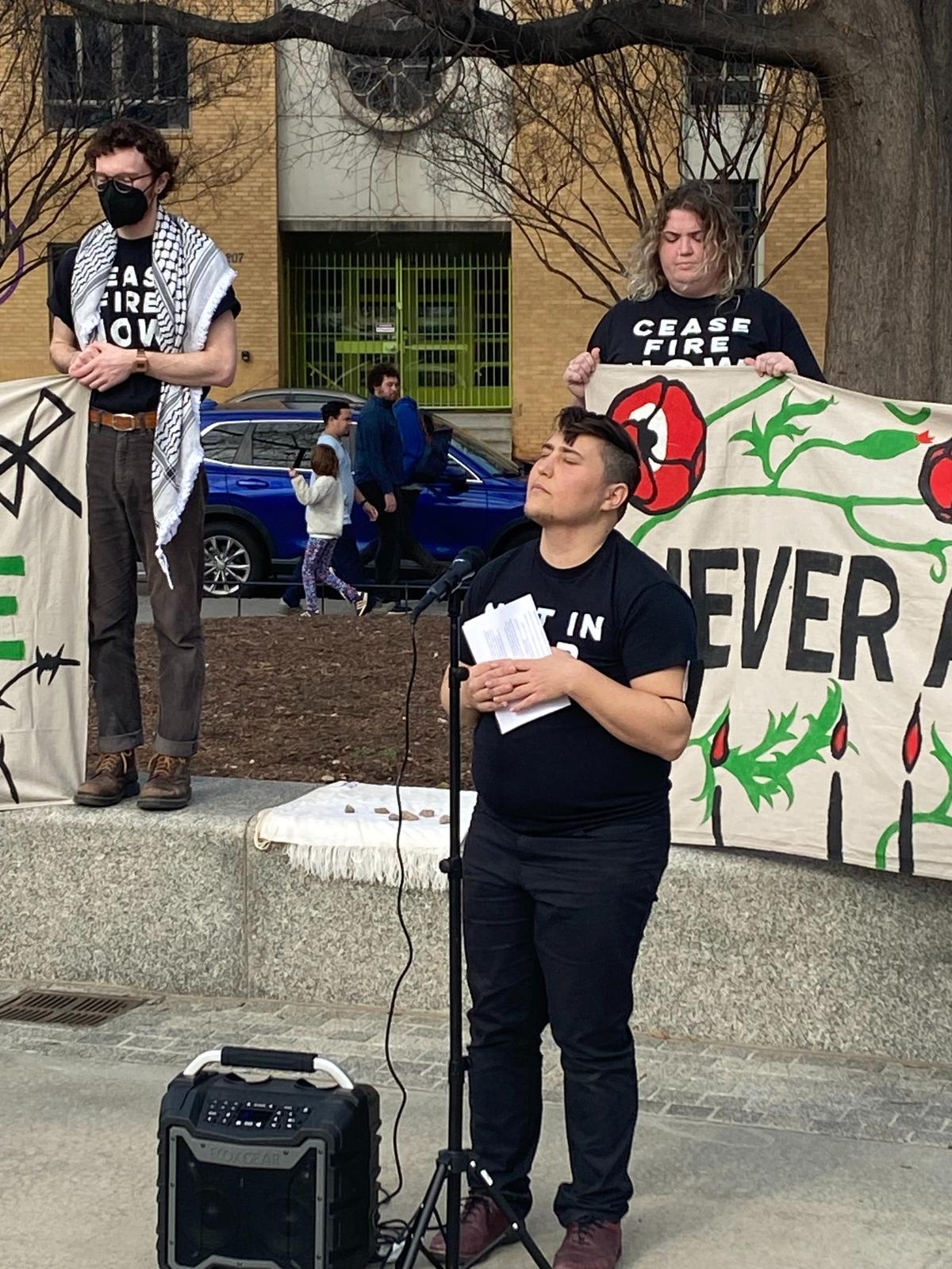 Student Rabbi Noah Rubin-Blose led the recitation of the Mourner’s Kaddish at Moore Square during a Holocaust Remembrance Day gathering in which hundreds called for a cease fire in Gaza.