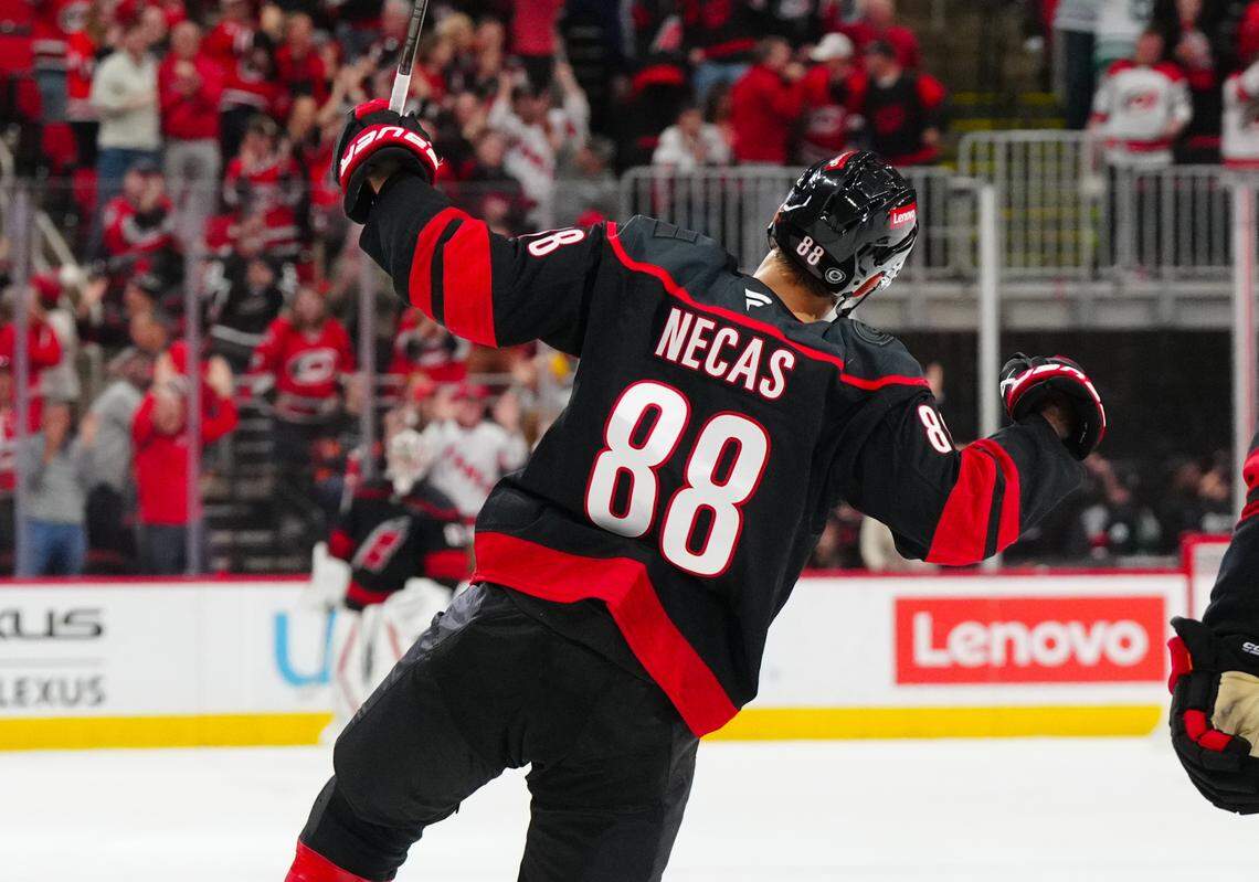 Nov 5, 2024; Raleigh, North Carolina, USA; Carolina Hurricanes center Martin Necas (88) scores the game winner against the Philadelphia Flyers during the third period at Lenovo Center. Mandatory Credit: James Guillory-Imagn Images