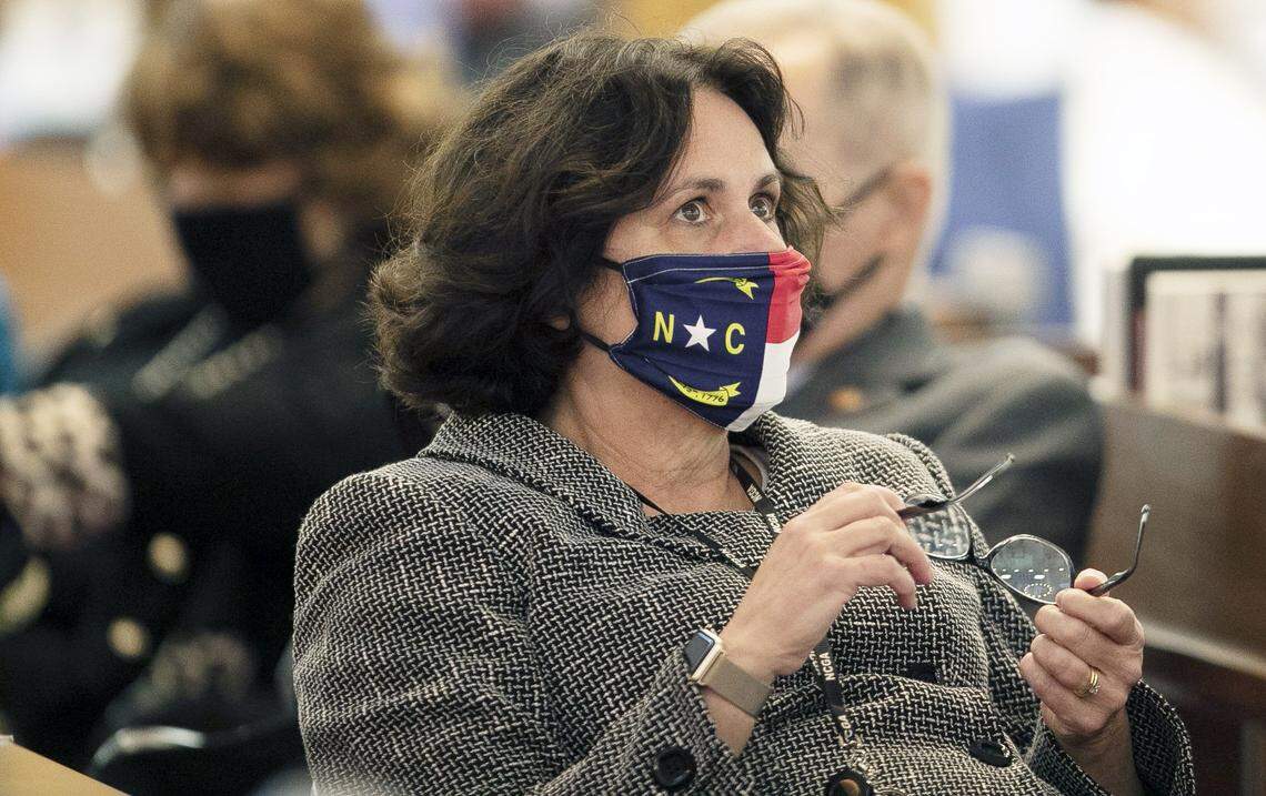 Rep. Sarah Stevens of Mt. Airy, NC wears a face covering with the North Carolina flag during the House session on Wednesday, January 27, 2021 in Raleigh N.C.