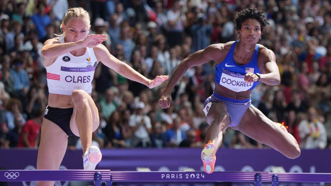 Aug 4, 2024; Paris, FRANCE; Anna Cockrell (USA) races Hanne Claes (BEL) in women’s 400-meter hurdles round 1 heats during the Paris 2024 Olympic Summer Games at Stade de France.