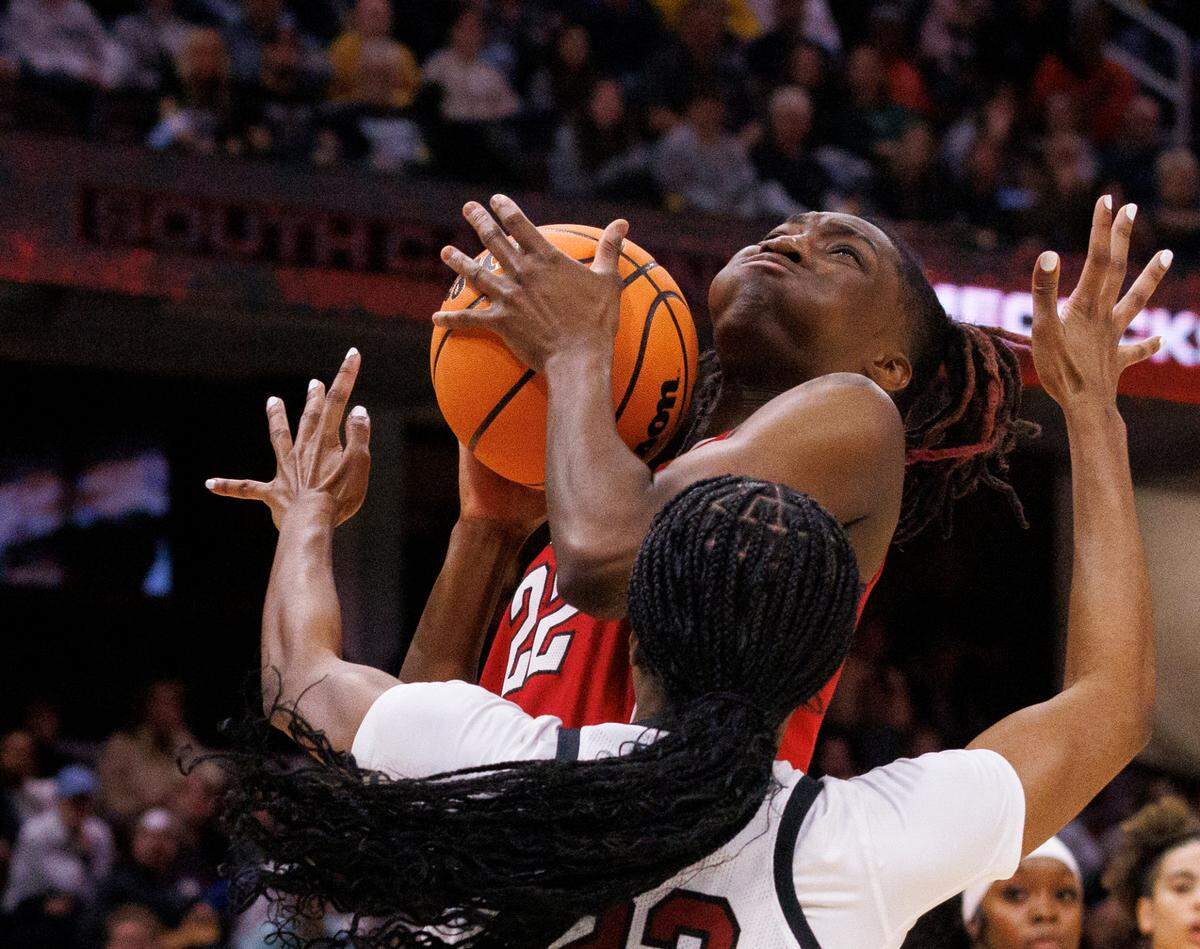 N.C. State’s Saniya Rivers drives against South Carolina’s Bree Hall during the first half of the Wolfpack’s 78-59 Final Four loss at Rocket Mortgage FieldHouse on Friday, April 5, 2024, in Cleveland, Ohio.