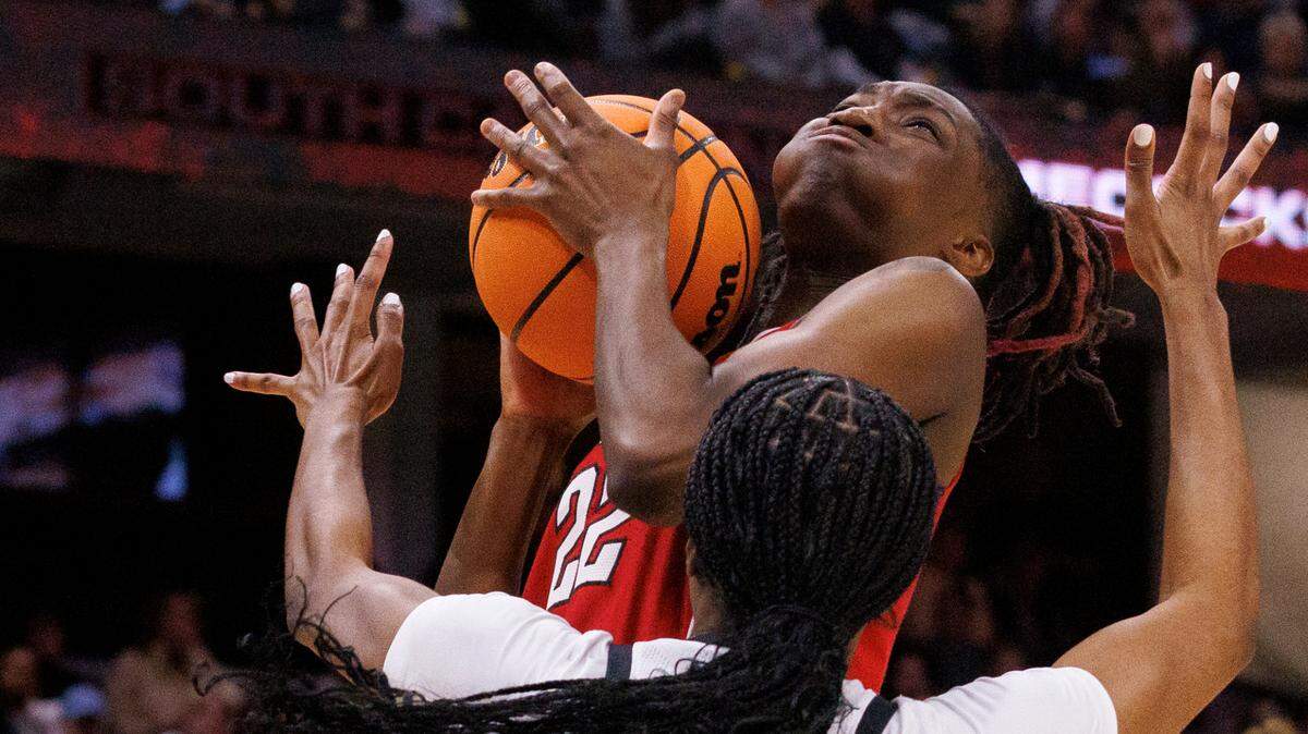 N.C. State’s Saniya Rivers drives against South Carolina’s Bree Hall during the first half of the Wolfpack’s 78-59 Final Four loss at Rocket Mortgage FieldHouse on Friday, April 5, 2024, in Cleveland, Ohio.