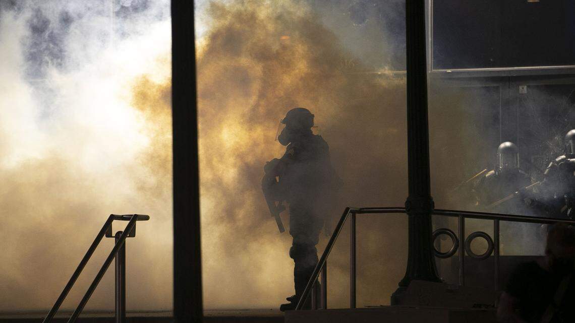 Raleigh Police and law enforcement protect the Wake County Courthouse on Fayetteville Street during a night of unrest, destruction and looting on Saturday, May 30, 2020 in Raleigh, N.C. The demonstrations and protest were in reaction to George Floyd’s death earlier this week in Minneapolis, MN.