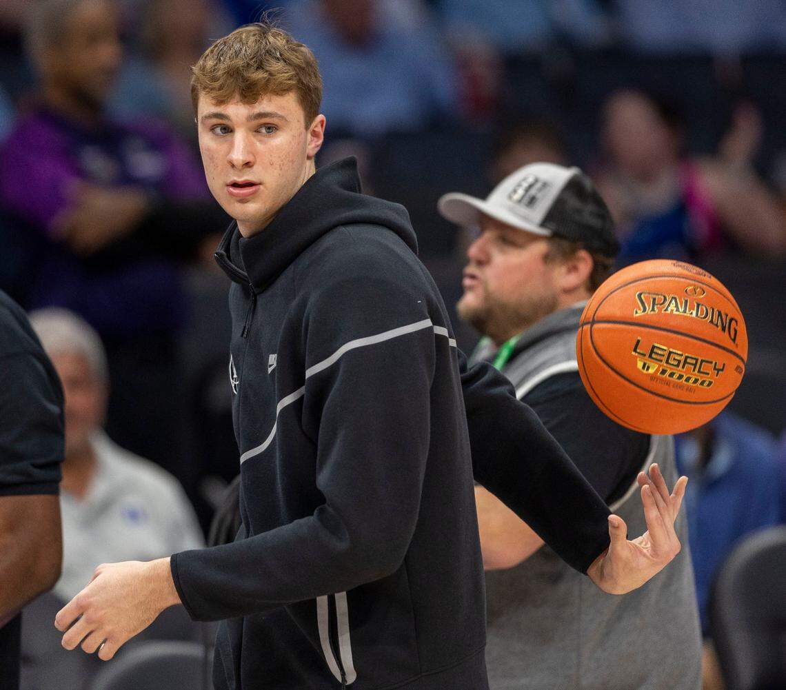 Duke’s Cooper Flagg (2) tosses the ball to teammates behind his back during pre-game warms up prior to the Blue Devils’ game against North Carolina on Friday, March 14, 2025 during the semifinals of the ACC Tournament at Spectrum Center in Charlotte, N.C. Flagg did not play after injuring himself against Georgia Tech.