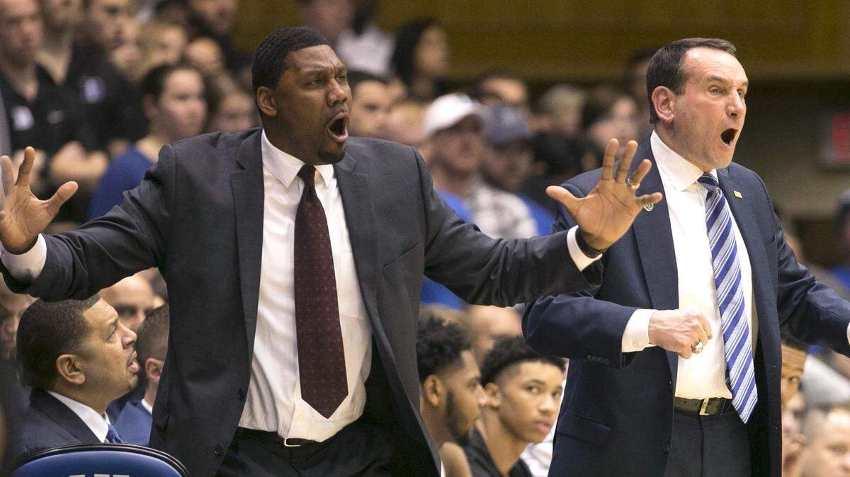 Duke coach Mike Krzyzewski and assistant Nate James react to a foul called against Duke during the second half against North Carolina on Saturday, March 3, 2018 at Cameron Indoor Stadium in Durham, N.C.