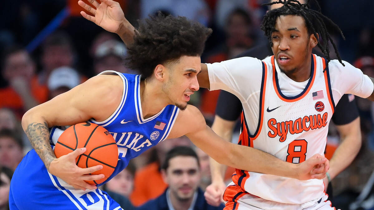 Duke Blue Devils guard Tyrese Proctor (5) drives against Syracuse Orange guard Elijah Moore (8) during the second half at the JMA Wireless Dome.