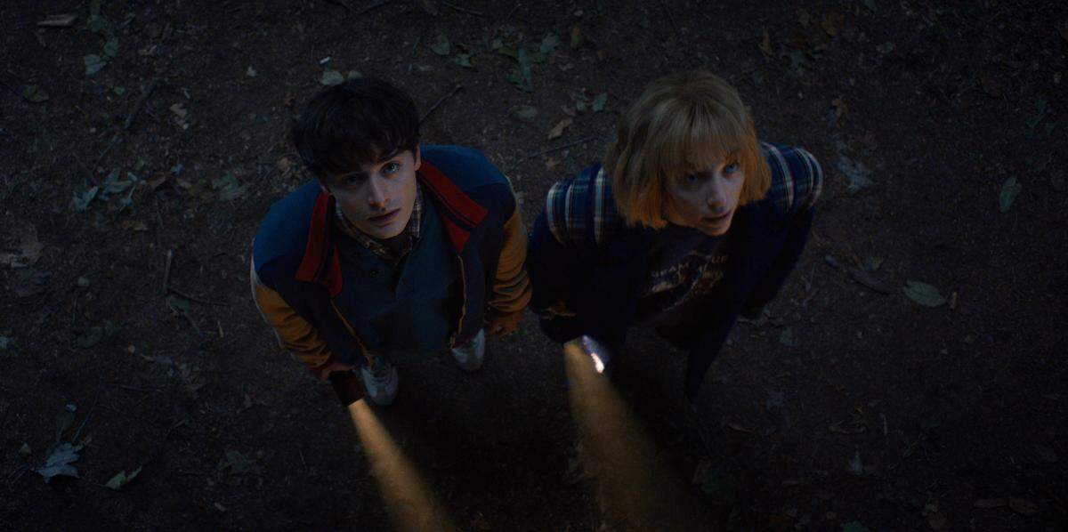 Noah Schnapp as Will Byers and Maya Hawke as Robin Buckley in Season 5 of “Stranger Things.”