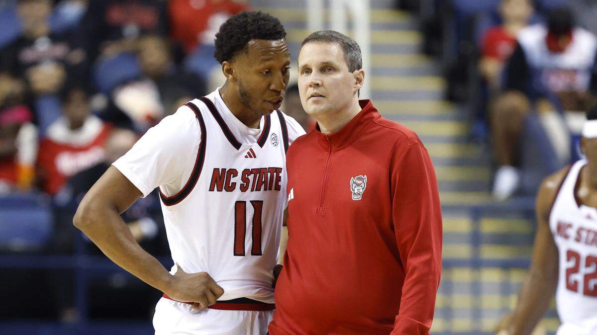 N.C. State head coach Will Wade talks to Quadir Copeland (11) during the first half of N.C. State’s exhibition game against South Carolina at the First Horizon Coliseum in Greensboro, N.C., Sunday Oct. 26, 2025.