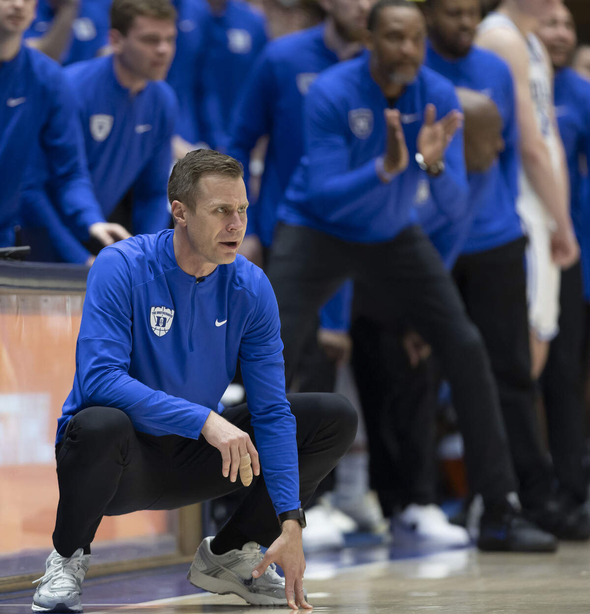 Duke coach Jon Scheyer takes watches his team pm offense in the  second half against North Carolina on Saturday, March 7, 2026 at Cameron Indoor Stadium in Durham, N.C.