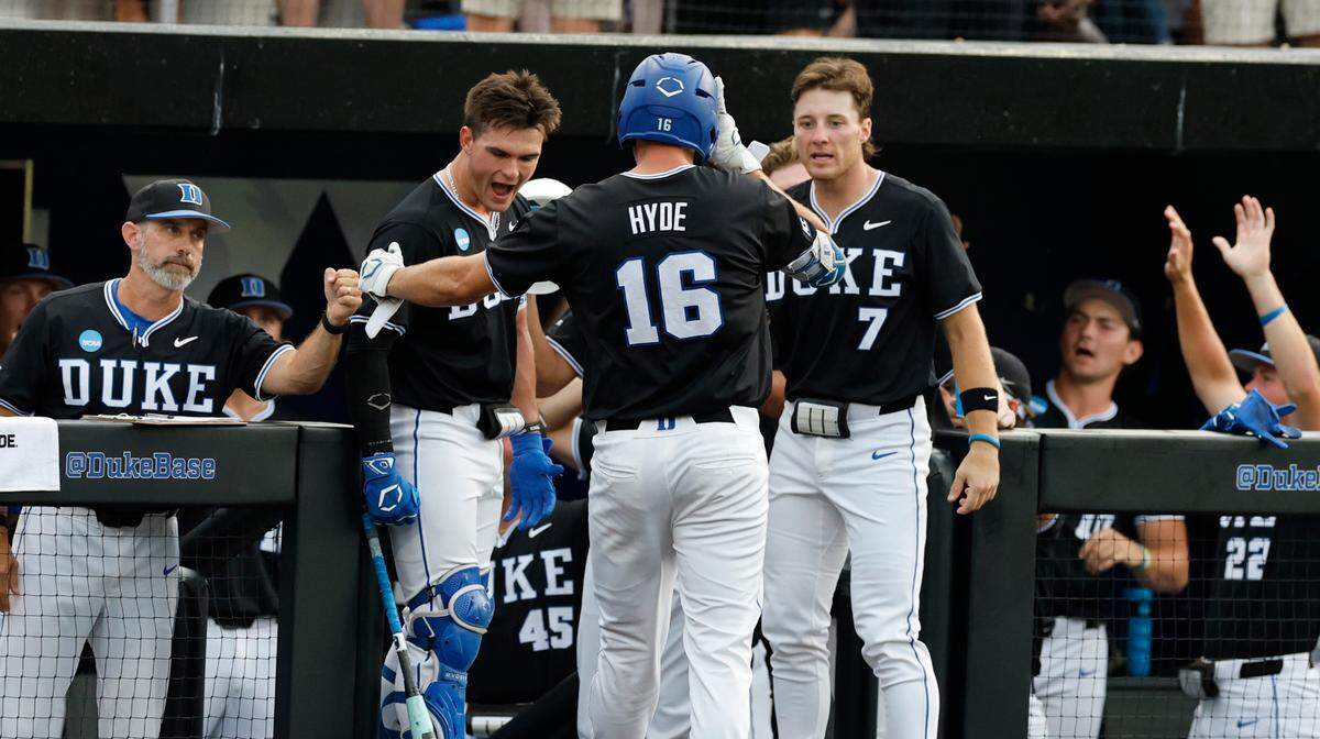 The Duke bench celebrates with Jake Hyde (16) after he hit a home run during Duke’s game against Murray State in the third game of the Durham Super Regional at Jack Coombs Field in Durham, N.C., Monday, June 9, 2025.