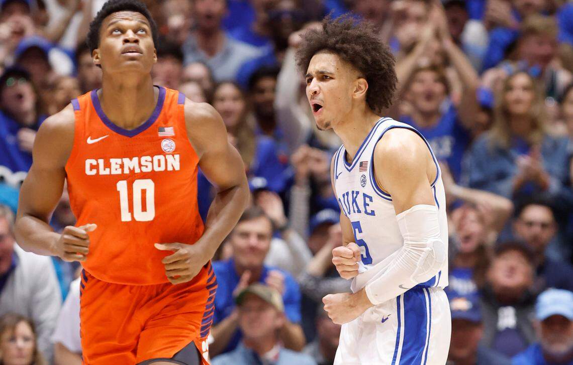 Duke’s Tyrese Proctor (5) celebrates as a timeout is called by Clemson during the first half of Duke’s game against Clemson at Cameron Indoor Stadium in Durham, N.C., Saturday, Jan. 27, 2024. Clemson’s RJ Godfrey (10) is to the left.