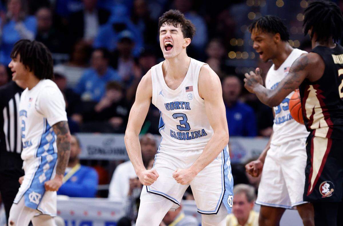 North Carolina’s Cormac Ryan (3) celebrates a Florida State turnover during the first half of UNC’s game against Florida State in the quarterfinal round of the 2024 ACC Men’s Basketball Tournament at Capital One Arena in Washington, D.C., Thursday, March 14, 2024.